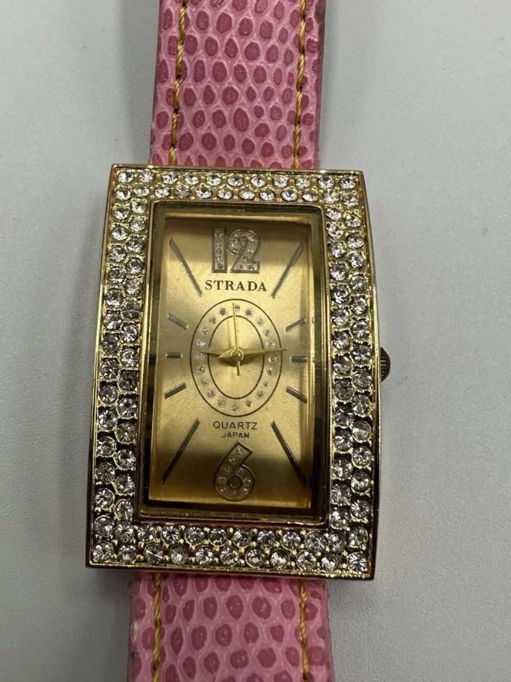 3/$30 Strada Watch Women Gold Tone Pink Faux Band Crystal Bling Bezel 9”